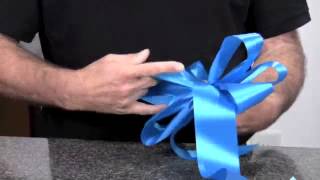 How to tie a floral bow for a wreath or garland [upl. by Kempe]