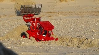 DIGGING A HOLE with RC wheel loader  LOCH AUSHEBEN mit dem OampK L25 Radlader [upl. by Ashla]