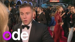 Red carpet blooper Downton Abbeys Allen Leech pops a button midinterview [upl. by Ahab140]