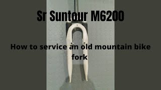 How to service an old mountain bike fork suntour m6200 restoration bike repair [upl. by Mark146]