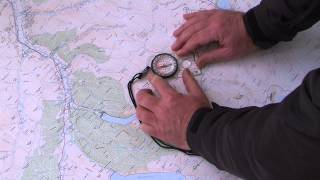 Taking a compass bearing from a map [upl. by Esemaj]