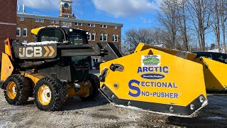 Snow plowing apartments with skid steer [upl. by Aisats]