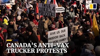 Canada cracks down on antivax trucker protests seize fuel and ban honking [upl. by Acirrej631]