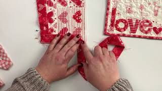 How to sew binding onto a quilt [upl. by Iphagenia287]