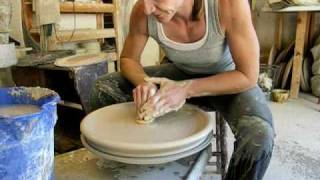 How to throw a large platter on the potters  pottery wheel [upl. by Ekud]