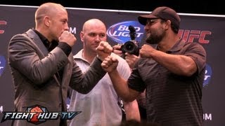 Georges StPierre vs Johny Hendricks face off amp press conference highlights [upl. by Hammer]