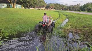 coleman 125cc test ride slow cruise through mud bigger wheels exhaust sprocket upgrades [upl. by Anoyk]