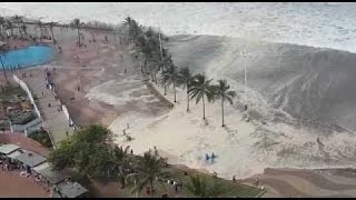 Japan Tsunami Caught On Camera  Ocean Overtops Wall [upl. by Ekaj]