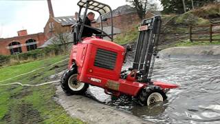 Moffett truckmounted forklift goes swimming  dive dive dive [upl. by Gnuh]