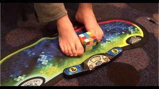 Rubiks Cube With Feet World Record 1696 Seconds [upl. by Ylrebmek28]