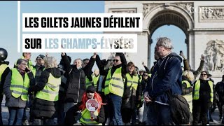 A Paris des gilets jaunes ont défilé sur les ChampsElysées [upl. by Bromleigh]