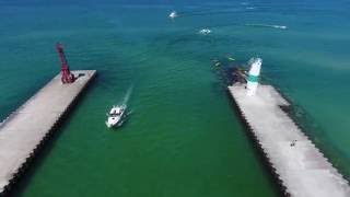 Pentwater Michigan 4K Drone DJI Phantom 4 Flying around the lake [upl. by Rephotsirhc]