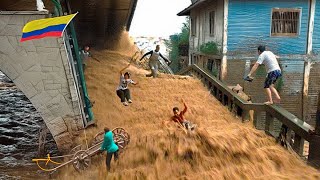 Extreme floods destroy streets in Colombia People climb to the top of the house [upl. by Casilde694]