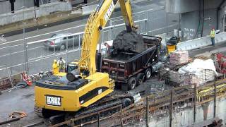 CAT 385C excavator loading a dump truck HD [upl. by Twelve]