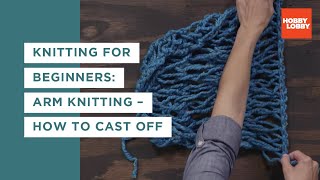 Knitting for Beginners Arm Knitting – How to Cast Off  Hobby Lobby® [upl. by Zel302]