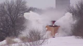 Watch snow drifts explode as train crashes through using old Illinois Central wedge plow [upl. by Amerd]