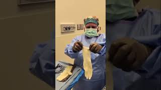 How do surgeons put their gloves on shorts [upl. by Esidnak]