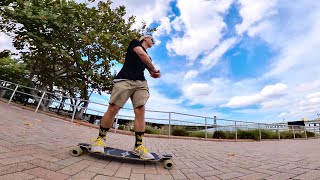 Longboard cruising waterfront Riverwalk Downtown Bradenton Florida [upl. by Pontone]