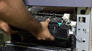 Replacing the upper fuser roller on toshiba e Studio 163 166 181 [upl. by Yentuoc]