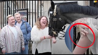 OUCH OUCH HORSE BITES AND WONT LET GO OF HER ARM Bitten by the Kings Horse at Horse Guards [upl. by Yuille103]