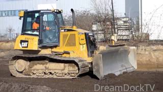 CATERPILLAR DOZER PUSHING GRAVEL I EARTHMOVERS AT CONSTRUCTION SITE [upl. by Greenquist]