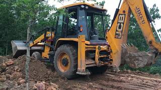 jcb 3dx levelling land by pushing soil using fronthoe [upl. by Allred]