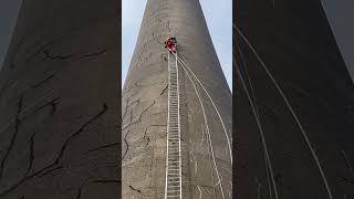 Steeplejacks laddering a 300ft stack steeplejack work workingatheights ropeaccess construction [upl. by Ikkim985]