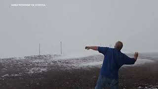 Snow and gusty winds hit inactive volcano summit on Hawaiis Big Island [upl. by Sawtelle962]