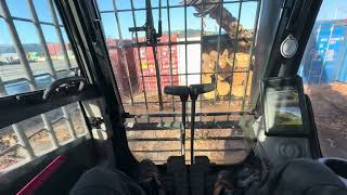 Loading Macrocarpa logs in containers Wellington New Zealand [upl. by Annaohj]