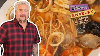 Guy Fieri Eats the quotSeafood Buffet for 90quot in Baltimore  Diners DriveIns and Dives  Food Network [upl. by Rehpotsirc]