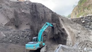 mining sandsand dredging excavators working to tear down cliffs in sand mining [upl. by Us207]