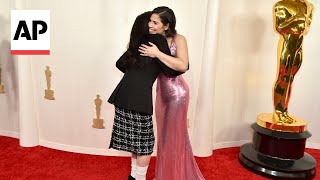 Billie Eilish and America Ferrera hug on the Oscars red carpet [upl. by Nahsaj]