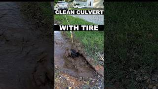 Clean 8 Inch Culvert With Lawnmower Tire [upl. by Wedurn]