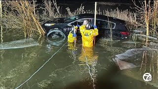 Woman rescued from submerged car in Macomb Township after flooding [upl. by Cykana]