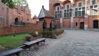 guide to malbork castle green route main entrance and courtyard Poland solo travel part 4 [upl. by Rufe939]