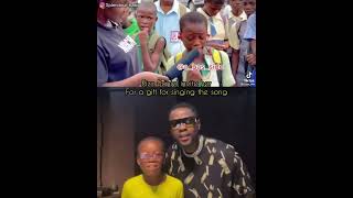 Kizz Daniel pour me water on the street by a little girl [upl. by Jair]