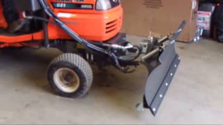 Kerstens FKDR attachment system with a snowplough on a Kubota G21 tractor [upl. by Annahvas899]