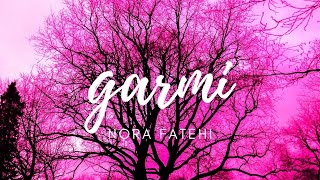 GARMILyrics Song NEHA KAKKAR ft NORA FATEHI [upl. by Gadmon]