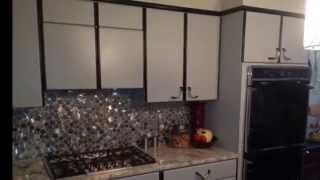 Airless Spray Paint Laminate Kitchen Cabinets [upl. by Enitsyrk]