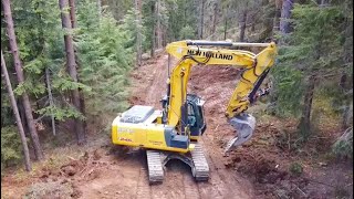 realizzazione STRADA FORESTALE con escavatore NEW HOLLAND E245 [upl. by Canica]