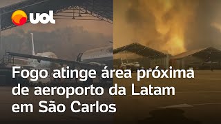 Fogo em SP Incêndio atinge área próxima de aeroporto da Latam em São Carlos vídeos [upl. by Daisi]