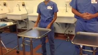 How to Aseptically Setup Surgical Gown and Gloves on Mayo Stand [upl. by Hanna]