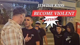 JEWISH KIDS BECOME VIOLENT AND ATTACK THE STREET PREACHERS BECAUSE OF THE NAME OF JESUS ISRAEL [upl. by Oigimer]