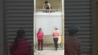 How to install a KENVO manual roller shutter door [upl. by Eelano]