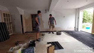 Installation of under floor heating Polypipe Overlay Plus panels and pipes for under floor heating [upl. by Sylvan262]