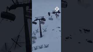 Ski lift passengers rush to safety as strong winds toss gondolas into the air in Italy [upl. by Aidahs]