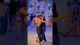 Watch a captivating Tango dance by a couple on Malagas Malagueta Beach promenade [upl. by Neeruan]