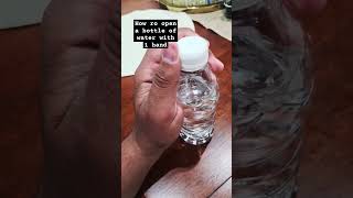 How to open a bottle of water with one hand [upl. by Yelreveb]