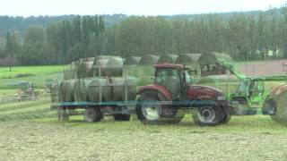 Andainage pressage amp enrubannage 2011 100 Case IHKrone  haymaking [upl. by Adnerad]