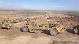 Digging new landfill cell with fleet of Caterpillar scrapers Part 1 [upl. by Ashok]